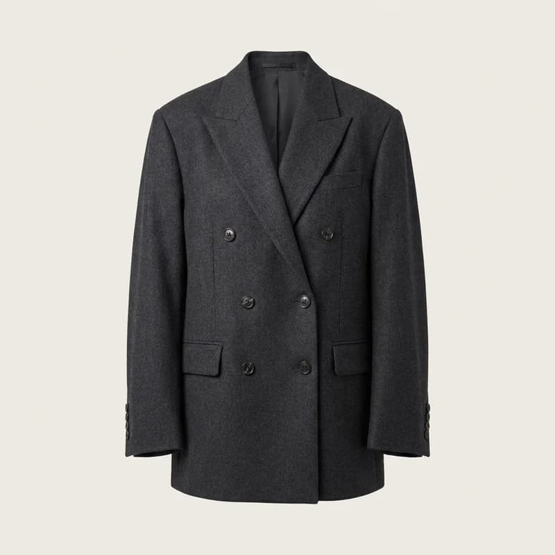 Oversized double-breasted wool blazer, photorealistic ghost-mannequin render, front view